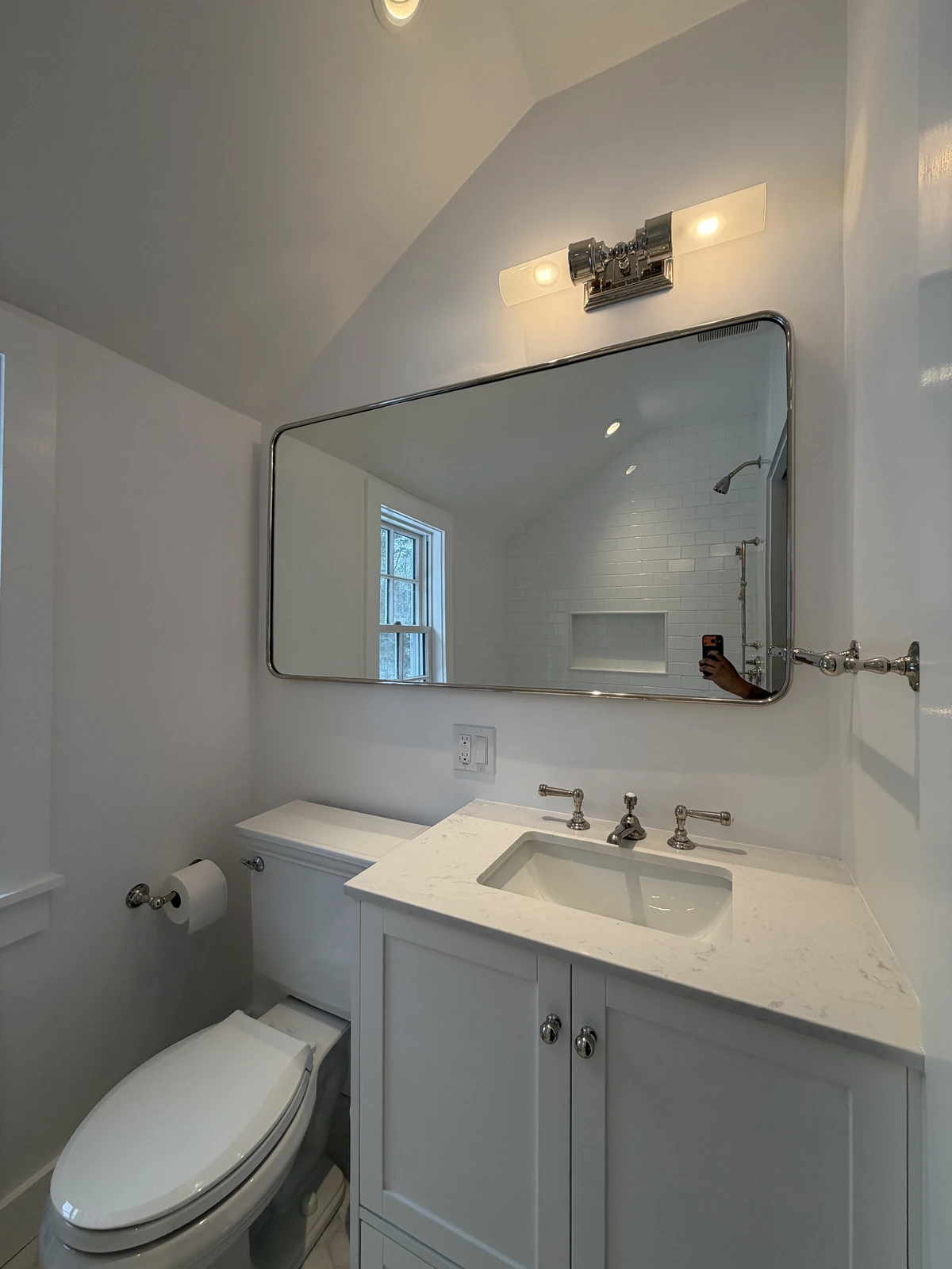 Vanity and mirror in a full bath remodel