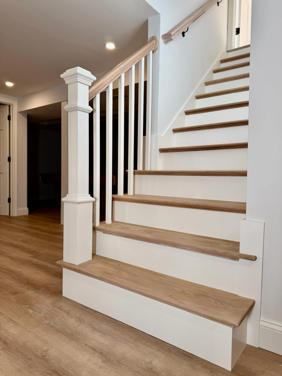 Open stair with black balusters