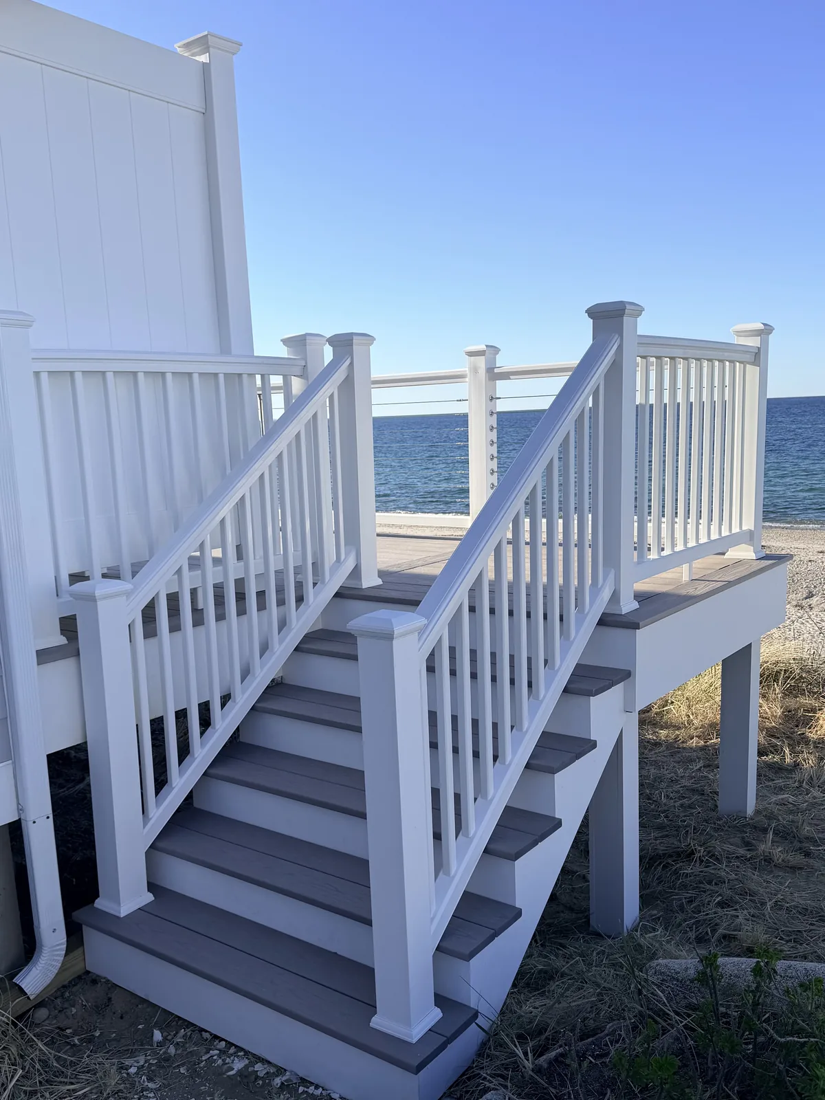 Deck stairs leading down to the beach