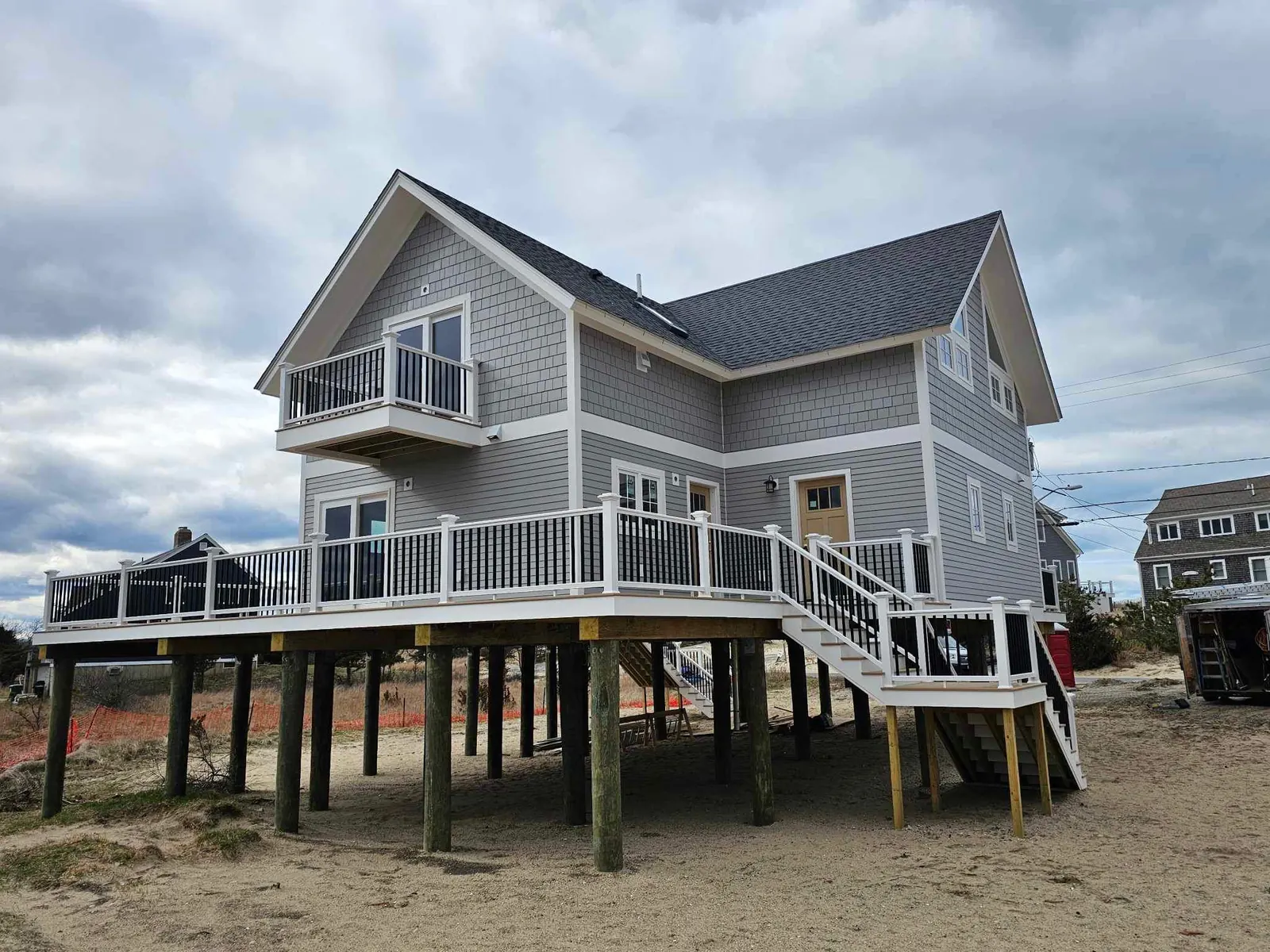 Coastal home on pilings with a wraparound deck