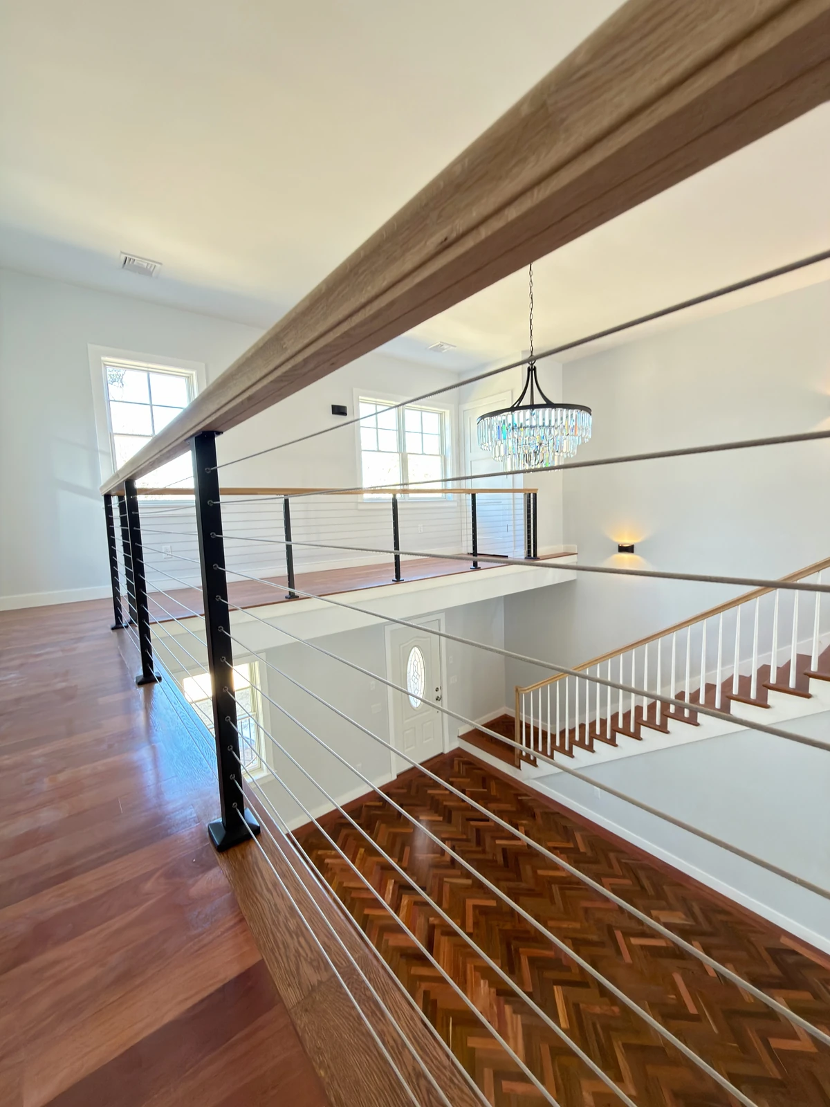 Hardwood floors on the second floor landing